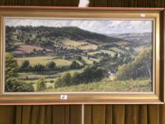 AN OIL ON CANVAS OF A COUNTRY HILLSIDE VIEW FRAMED 59 X104CMS
