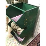 A VINTAGE GREEN METAL THREE TIER PRODUCE CONTAINER ON WHEELS AND ADJUSTABLE