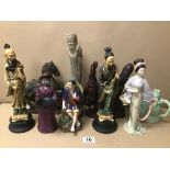 A COLLECTION OF ORIENTAL FIGURES, INCLUDING RESIN, CERAMIC AND STONE EXAMPLES
