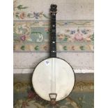 A VINTAGE BANJO FOUR STRING WITH MOTHER IN PEARL INLAID (106)