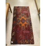 A VINTAGE RUG 64 X 143CMS