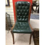A VINTAGE GREEN LEATHER BUTTON BACK CHAIR