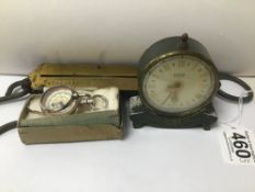 THREE MIXED ITEMS A FISHING SALTERS SCALES NO 3, SWIZA ALARM CLOCK AND A COMBINED MAP MEASURER,