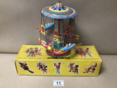 A VINTAGE PELHAM PUPPET OF A CAT, IN ORIGINAL BOX, TOGETHER WITH A TIN PLATE FAIRGROUND TOY