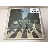 AN ABBEY ROAD THE BEATLES FOUR TRACK STEREO TAPE RECORD DATED 1969 (CASE BROKEN)