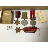 A GROUP OF FOUR WWII MEDALS IN ORIGINAL BOX, COMPRISING; 1939-45 STAR, BURMA STAR, DEFENCE MEDAL AND