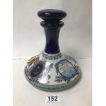 A WADE PUSSER'S RUM BRITISH NAVY DECANTER WITH ORIGINAL STOPPER, LACKING CONTENTS, 21.5CM HIGH