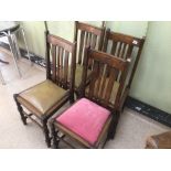 A SET OF FOUR ARTS'N'CRAFTS OAK DINING CHAIRS