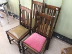 A SET OF FOUR ARTS'N'CRAFTS OAK DINING CHAIRS