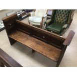 A STAINED PINE CHURCH PEW/BENCH WITH DETAILED SIDES 172 X 50 X 90CM