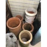 FIVE TERRACOTTA CHIMNEY POTS LARGEST 78CM