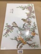 A PORCELAIN CHINESE PLAQUE DECORATED WITH BIRDS IN THE TRESS 49 X 30CM