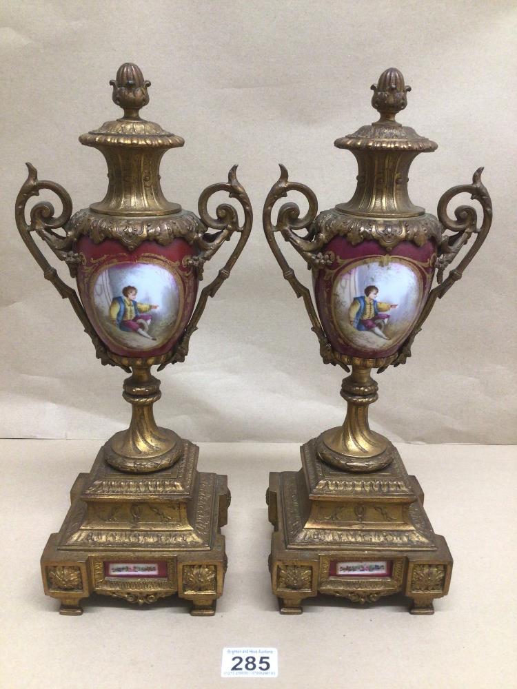 A PAIR OF HAND PAINTED PORCELAIN AND GILT METAL 19TH CENTURY GARNITURE 39CM