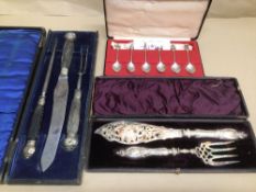A PAIR OF PLATED AND ENGRAVED FISH SERVERS, THREE PIECE BONE HANDLED CARVING SET AND SIX SILVER