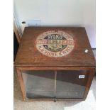 A VINTAGE TABLETOP ADVERTISING SEWING CABINET ON SWIVEL BASE (DEWHURSTS)