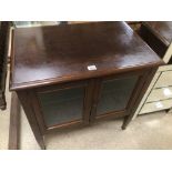 A MAHOGANY GLASS FRONTED CABINET