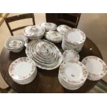 A SIXTY-SIX PIECE DINNER SERVICE G.D AND CO LIMOGES FRANCE