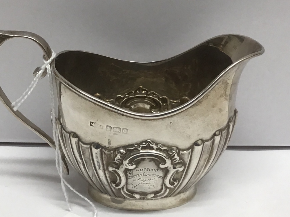 AN OVAL HALLMARKED SILVER HALF FLUTED CREAM JUG, 78 GRAMS - Image 2 of 3