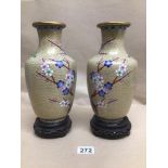 A PAIR OF CHINESE CLOISONNE VASES OF BALUSTER FORM DECORATED IN CHERRY BLOSSOM BOTH ON WOODEN STANDS