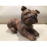A VINTAGE SOFT BROWN LEATHER SEATED DOG 45CMS