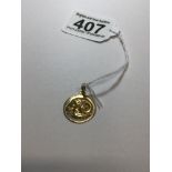 A STAMPED 750 PENDANT WITH AN ARIES ZODIAC EMBOSSED ON THE PENDANT 3 GRAMS