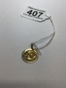 A STAMPED 750 PENDANT WITH AN ARIES ZODIAC EMBOSSED ON THE PENDANT 3 GRAMS