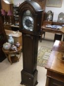 A VINTAGE OAK CASED TEMPUS FUGIT WESTMINSTER CHIME LONGCASE CLOCK WITH A SILVER PLAQUE (TO INSPECTOR