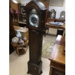 A VINTAGE OAK CASED TEMPUS FUGIT WESTMINSTER CHIME LONGCASE CLOCK WITH A SILVER PLAQUE (TO INSPECTOR