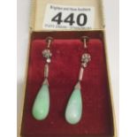 A PAIR OF JADE DROP EARRINGS WITH DIAMOND SET BARS AND CLUSTER TOPS ON SCREWS (1 DIAMOND MISSING)
