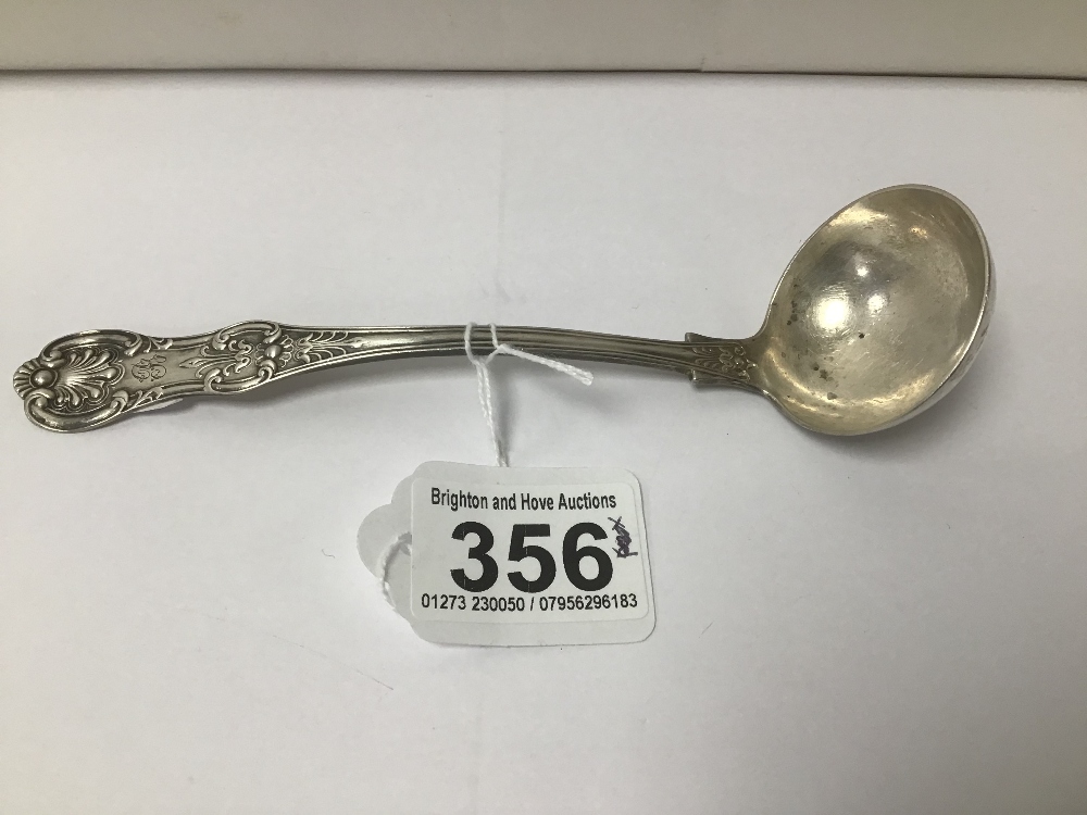 A VICTORIAN PERIOD SCOTTISH HALLMARKED SILVER FIDDLE AND SHELL PATTERN SAUCE LADLE BY CHARLES ROBB