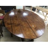 A LARGE VICTORIAN PERIOD OAK WAKE TABLE FULLY EXTENDED 229 X 155CM