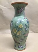 A GREEN CHINESE BALUSTER SHAPED VASE 20TH CENTURY 36 CM