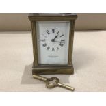 AN ENGLISH GARRARD AND CO LONDON BRASS CARRIAGE CLOCK WITH KEY