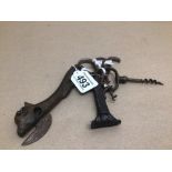 CIRCA 1900 TWO CAST IRON BOTTLE OPENERS ONE SHAPED AS A HAND, ONE SHAPED AS A COW ALSO TWO CAST IRON