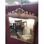 A GEORGIAN WALL MIRROR WITH GILDED BORDER AND SHALL 72 X 71CM