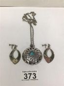 A MEXICAN SILVER PENDANT WITH CHAIN AND EARRINGS