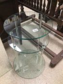 A MODERN ROUND GLASS SIDE TABLE 66 X 40CM