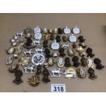 A TIN OF MIXED MILITARY BUTTONS AND BADGES