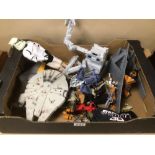 A COLLECTION OF PLASTIC STAR WARS FIGURES AND MODELS