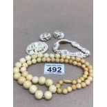 A GRADUATED SET OF 19TH CENTURY IVORY BEADED NECKLACE WITH A SET OF RESIN COSTUME JEWELLERY