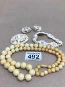 A GRADUATED SET OF 19TH CENTURY IVORY BEADED NECKLACE WITH A SET OF RESIN COSTUME JEWELLERY