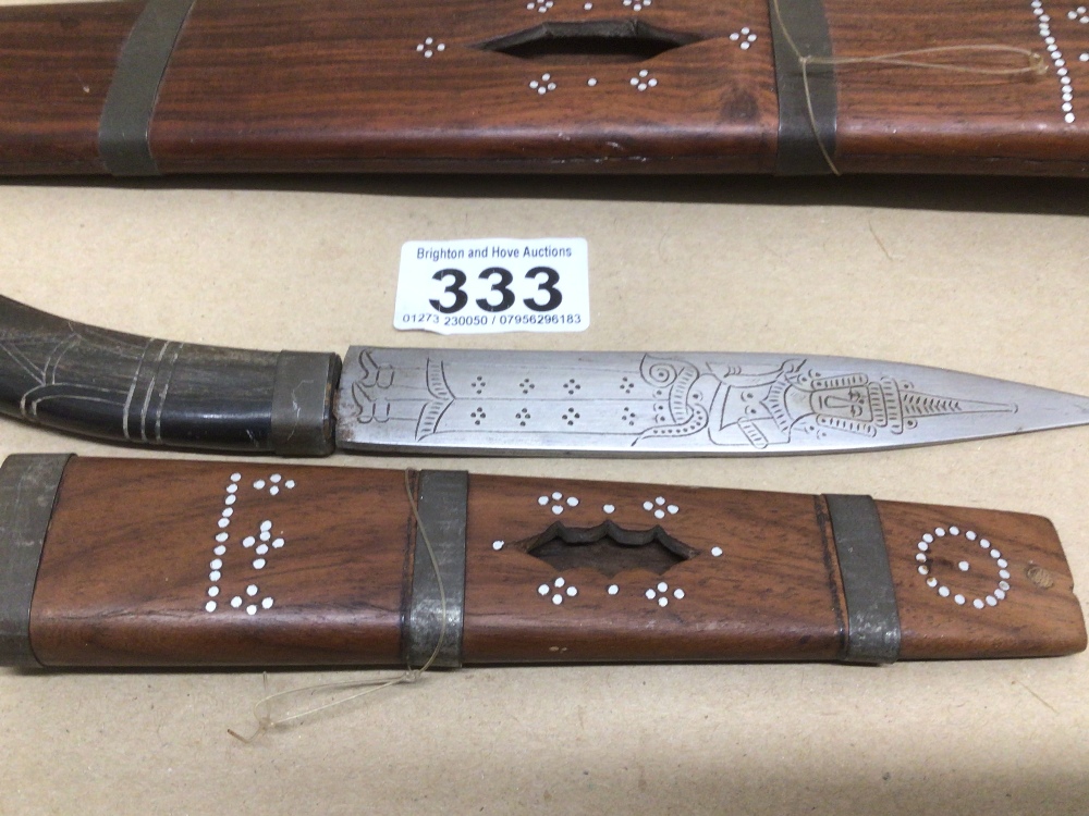 TWO EASTERN DAGGERS WITH SHEATHS ONE WITH A HORN CARVED HANDLE WITH MOTHER OF PEARL INLAY AND ONE - Image 2 of 5