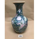 A FAMILLE ROSE LIME GREEN BALBUS VASE DECORATED WITH FLOWERS AND DRAGON CHARACTER MARKS TO BASE