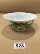 A CHINESE PORCELAIN BOWL DECORATED WITH FLOWERS AND BUTTERFLIES CHARACTER MARKS TO THE BASE A/F