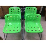 A SET OF FOUR MODERN GREEN AND CHROME STACKING ROBIN DAY POLO CHAIRS