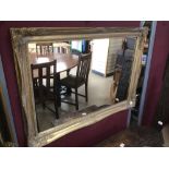 A LARGE MODERN GILDED MIRROR 106 X 75CM