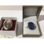 TWO SILVER RINGS ONE WITH A SEMI-PRECIOUS STONE RING SIZE O AND R