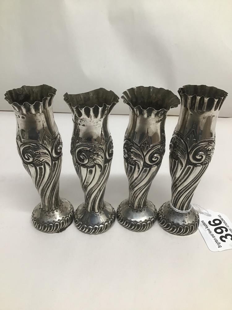 FOUR WEIGHTED ART NOUVEAU PERIOD CANDLESTICKS DATED 1891 BY CORNELIUS DESORMEAUX SANDERS AND JAMES