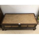 A VINTAGE LOW COFFEE TABLE WITH TWO DRAWERS FOR STORAGE