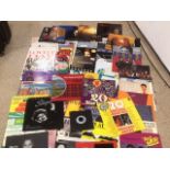 A COLLECTION OF MAINLY 12" SINGLES, EDDY GRANT, MADNESS, KYLIE AND MORE